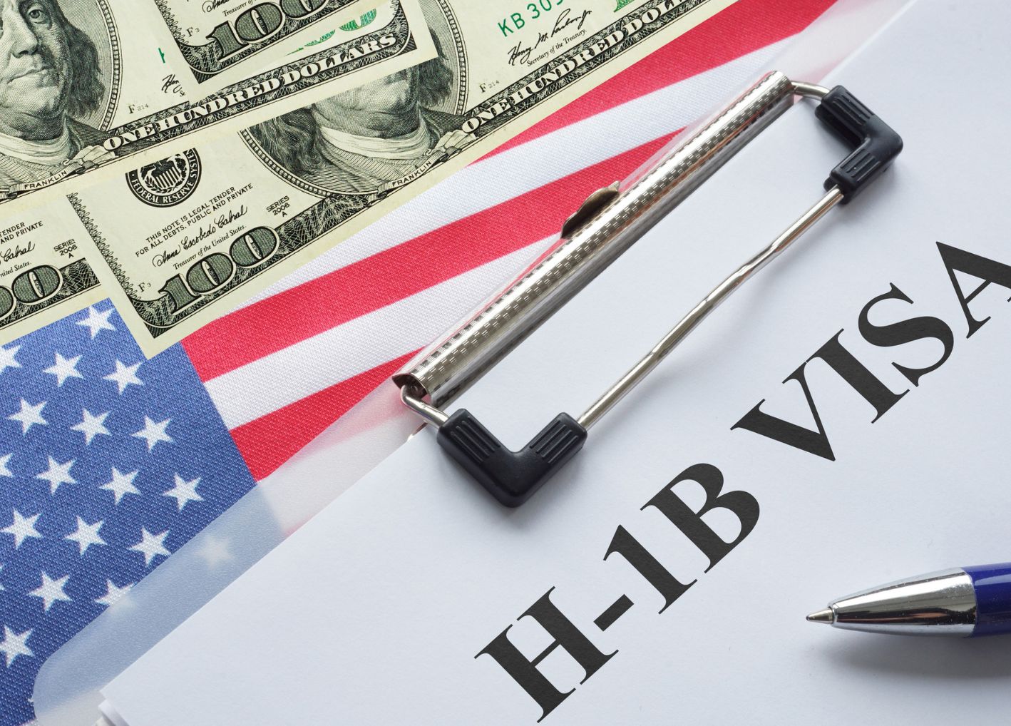 U.S. currency, American flag and H-1B Visa