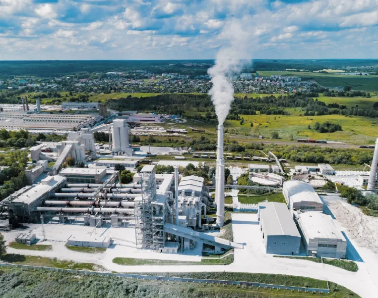 Industrial plant/factory with smokestack