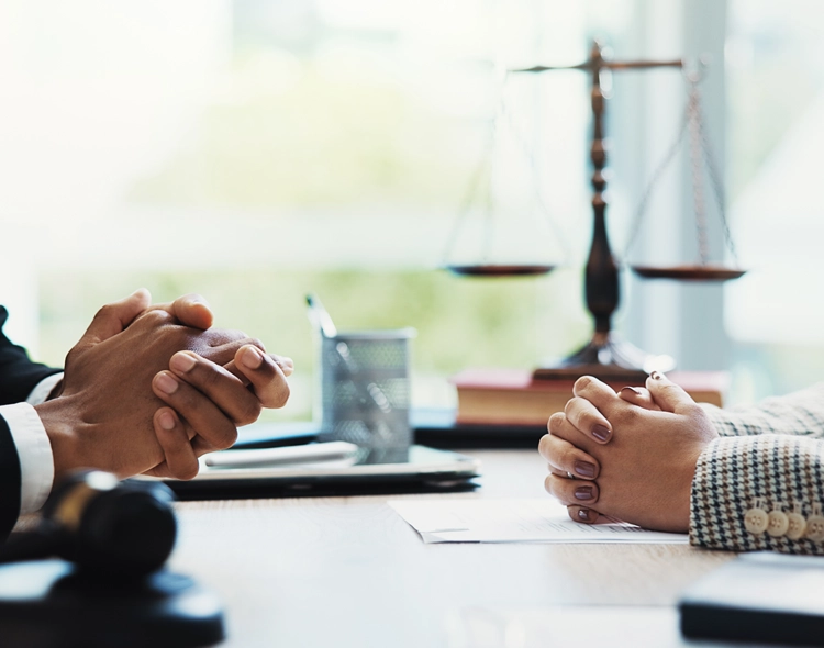 Gavel, lawyers and hands of business people in meeting for legal consultation