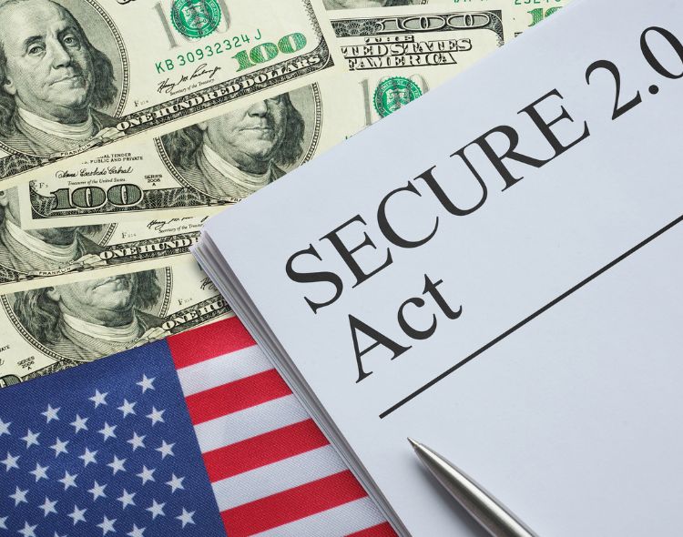 Secure 2.0 Act paper on top of money and American flag
